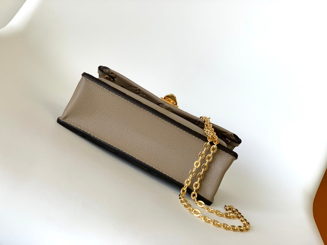 Louis Vuitton Elegant Taupe Embossed Leather Flap Handbag with Gold Chain Strap