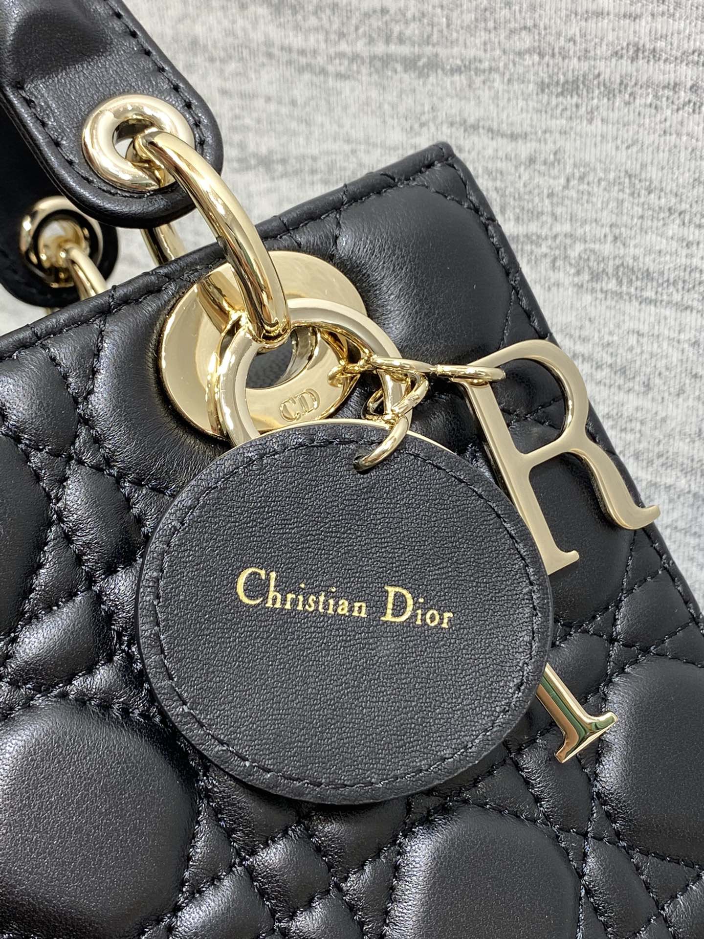 Dior Black Quilted Leather Top Handle Crossbody Bag with Gold Charms