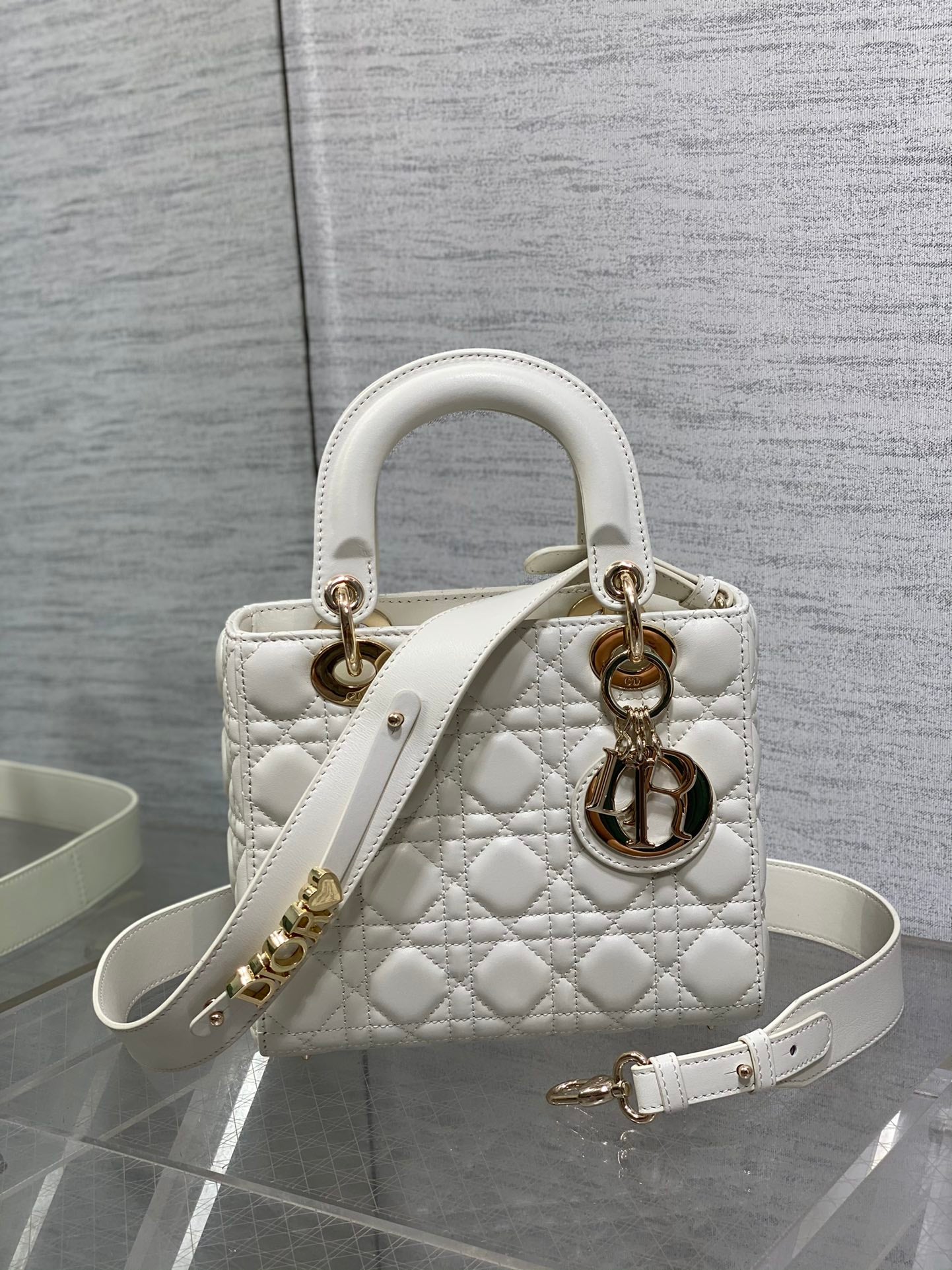 Dior Elegant White Quilted Leather Handbag with Gold-Tone Accents