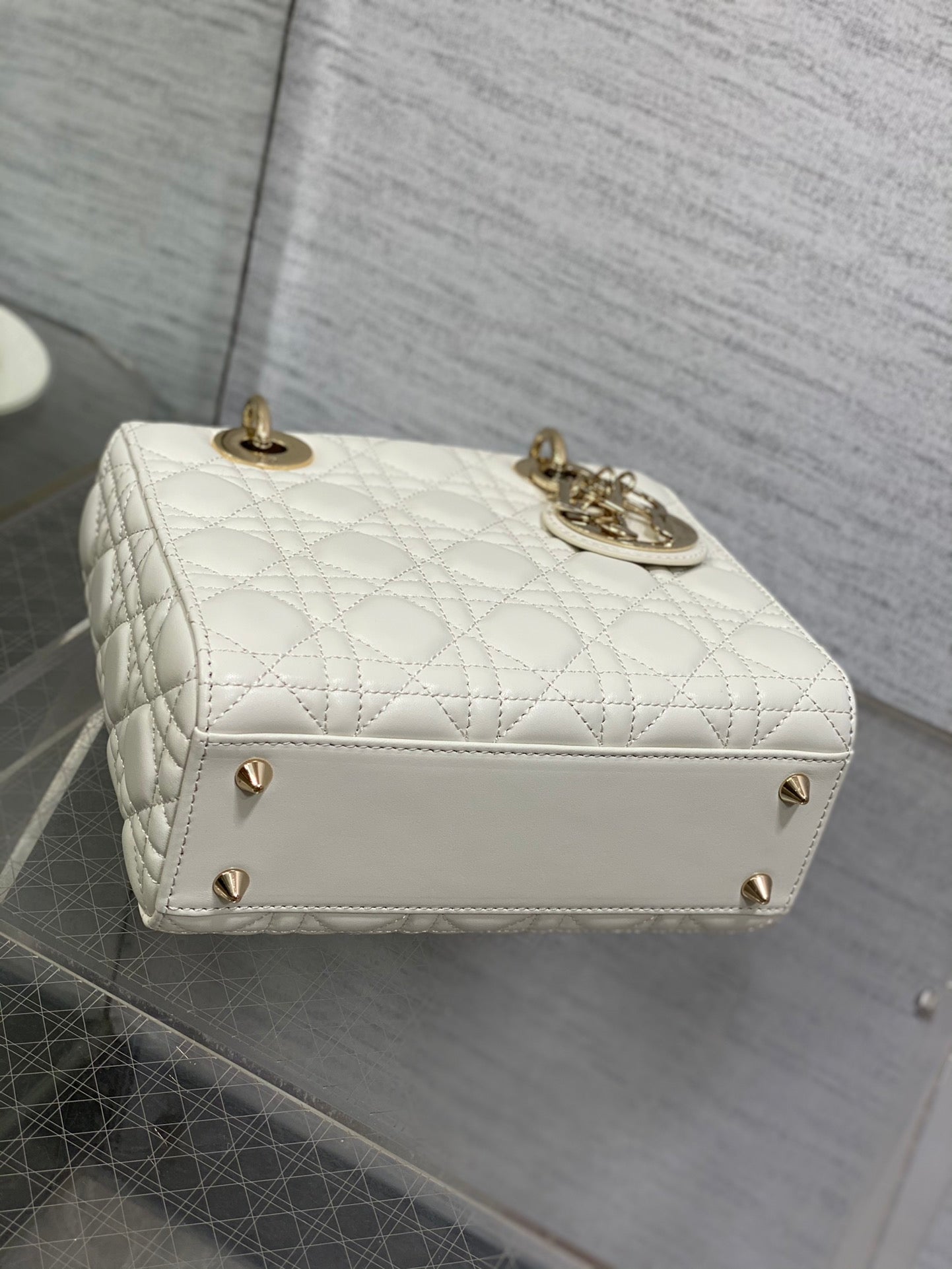 Dior Elegant White Quilted Leather Top Handle Bag with Shoulder Strap