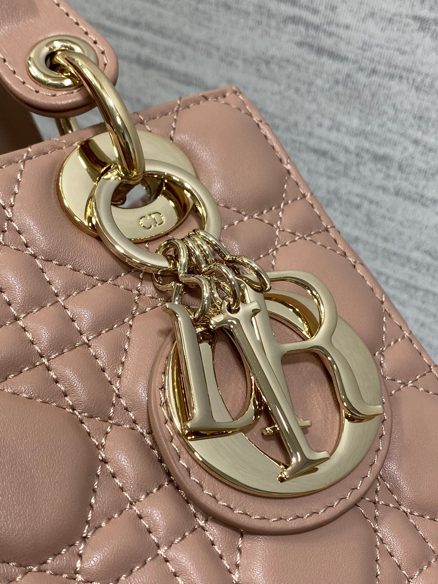 Dior Elegant Nude Pink Quilted Leather Handbag with Shoulder Strap