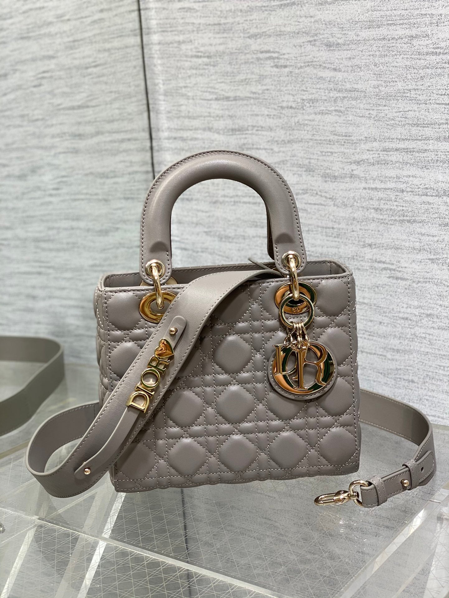 Dior Elegant Grey Quilted Leather Top Handle Bag with Crossbody Strap