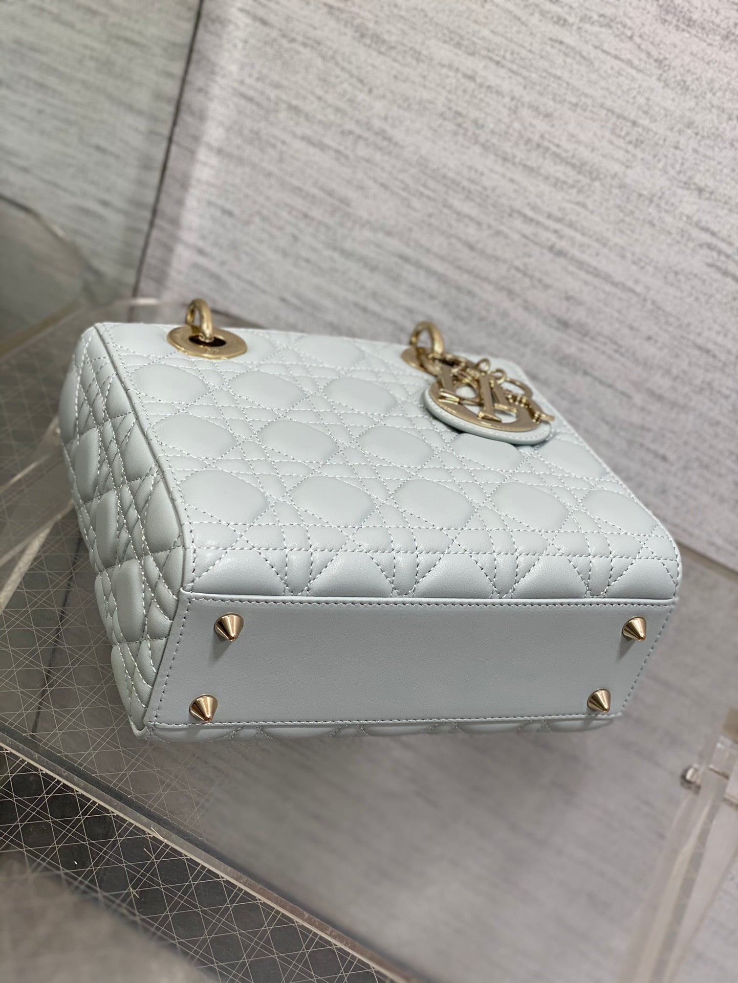 Dior Elegant Light Blue Quilted Leather Handbag with Crossbody Strap