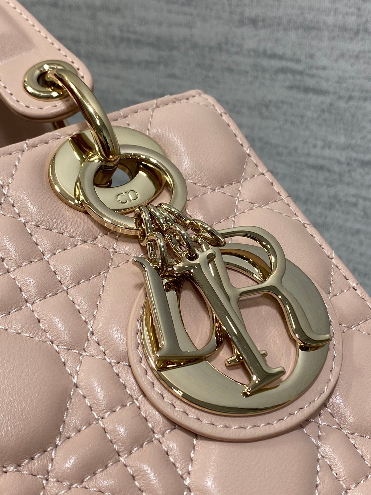 Dior Light Pink Quilted Leather Handbag with Top Handle and Gold Hardware