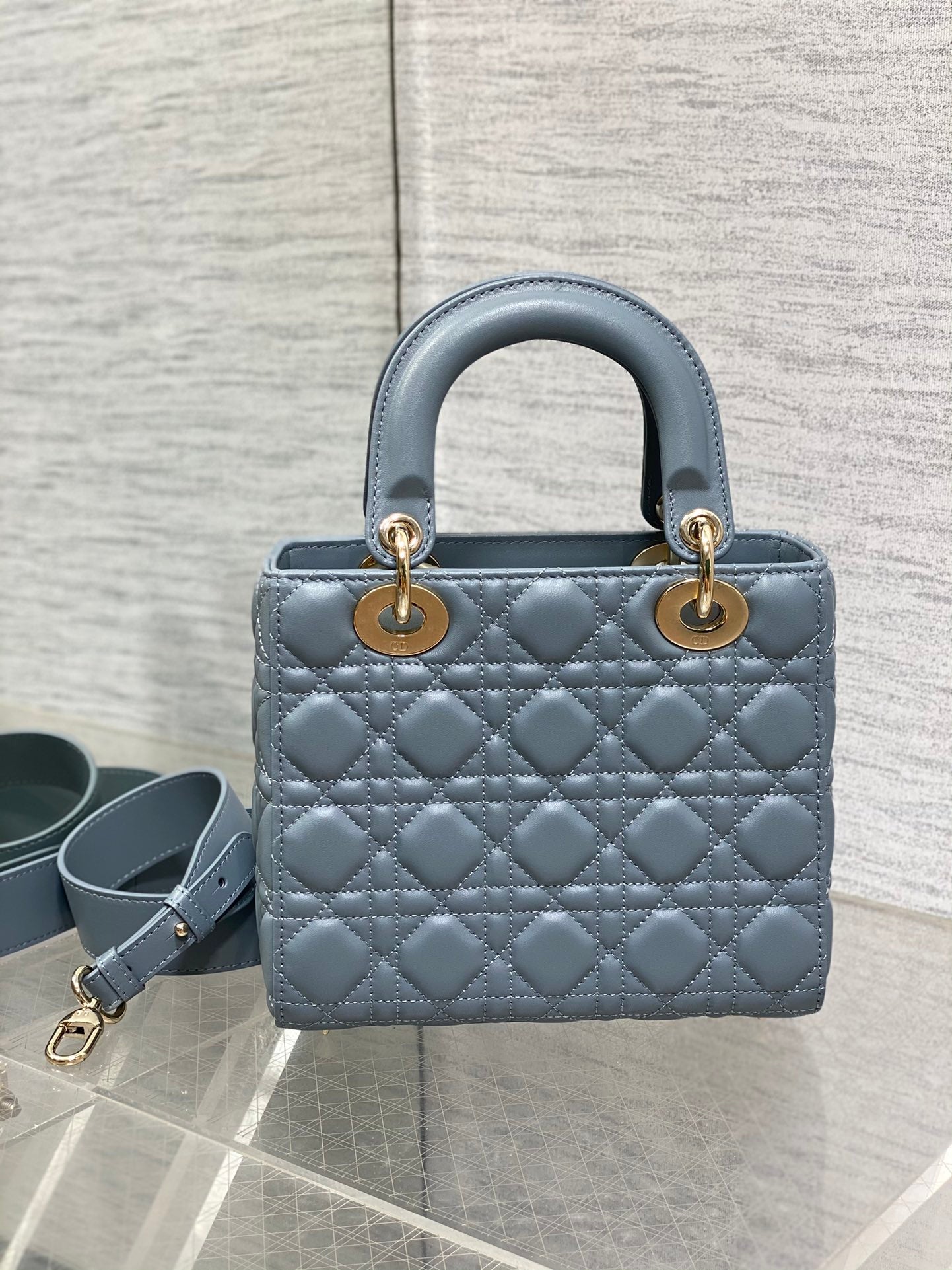 Dior Elegant Dusty Blue Quilted Leather Handbag with Top Handle
