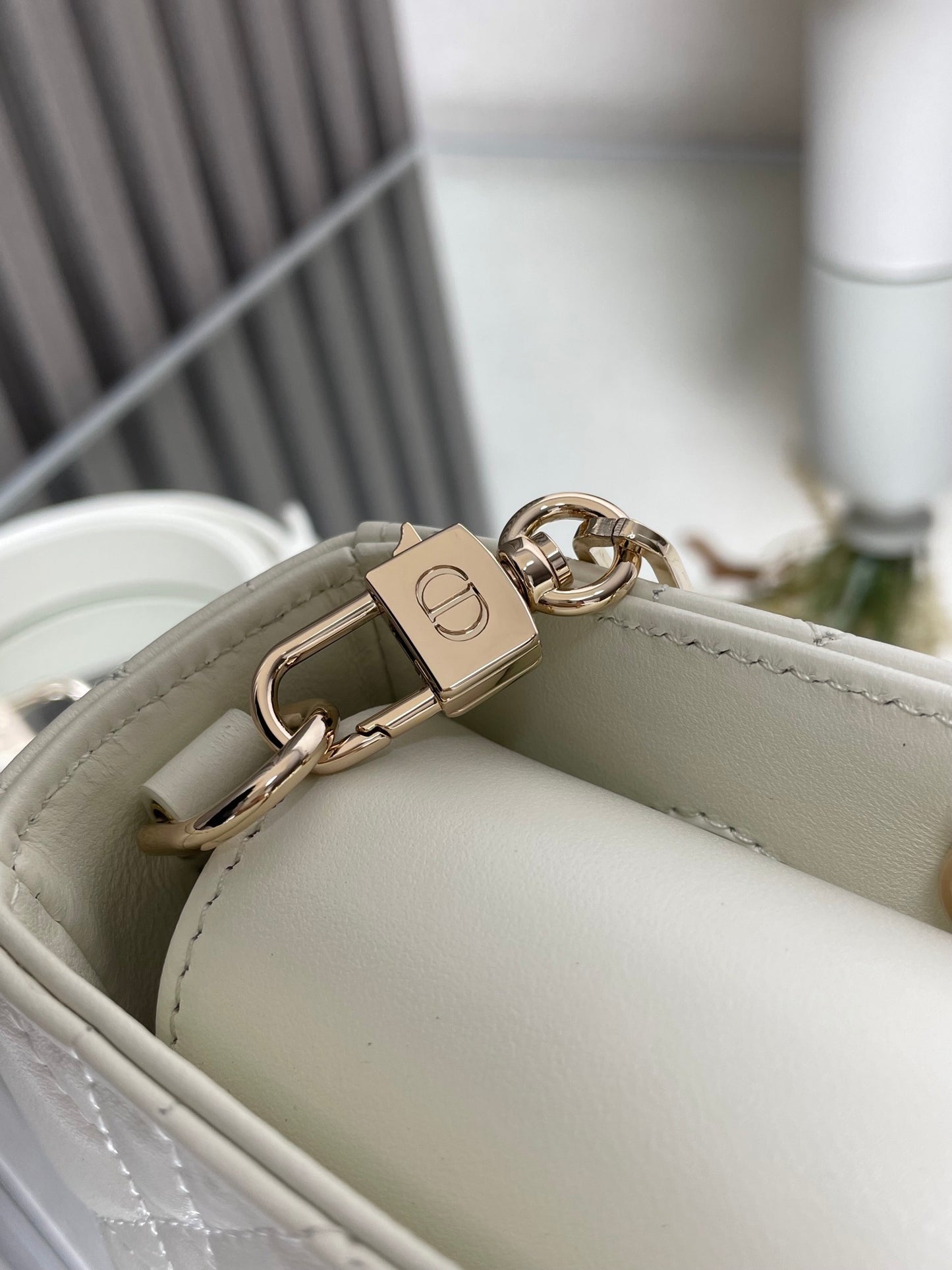 Dior Elegant White Quilted Leather Top Handle Bag with Gold Chain Strap