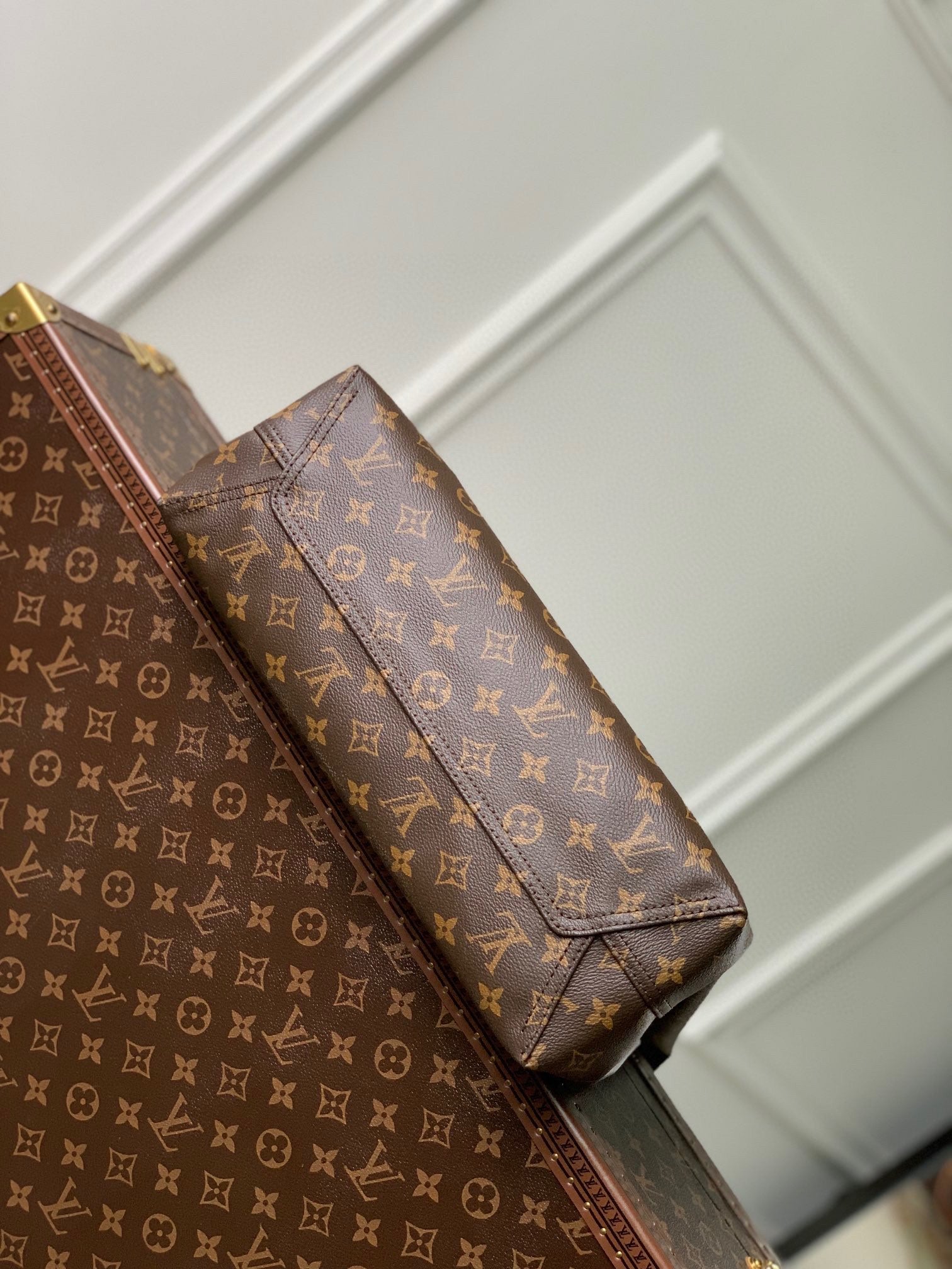Louis Vuitton Brown Monogram Asymmetric Canvas Triangle Hobo Bag