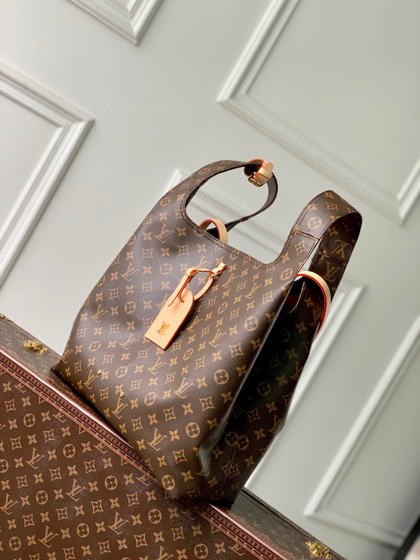 Louis Vuitton Brown Monogram Asymmetric Canvas Triangle Hobo Bag