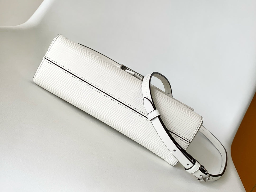 Louis Vuitton Elegant White Textured Leather Handbag with Top Handle and Strap