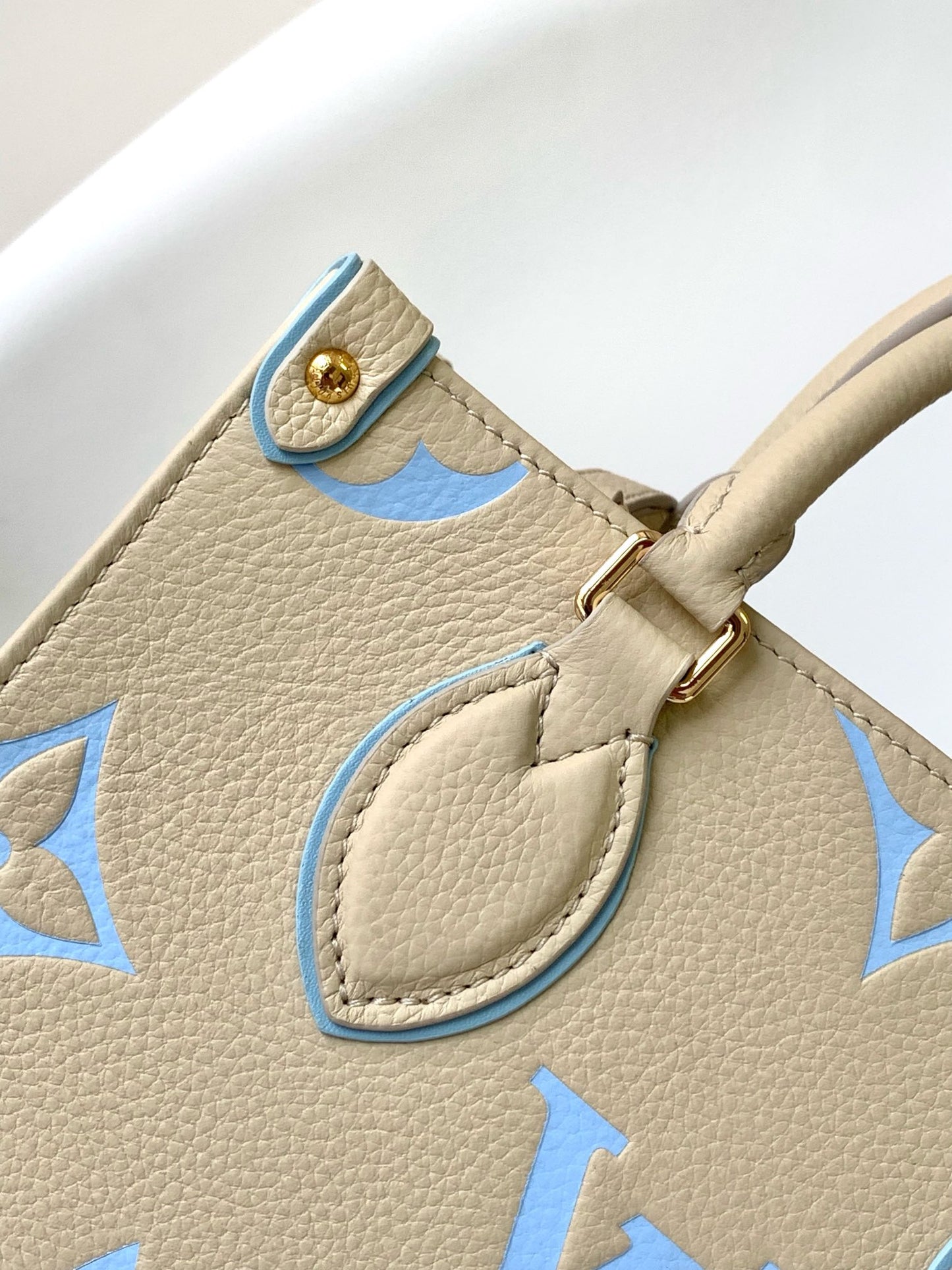 Louis Vuitton Chic Cream and Pastel Blue Monogram Embossed Leather Tote Handbag