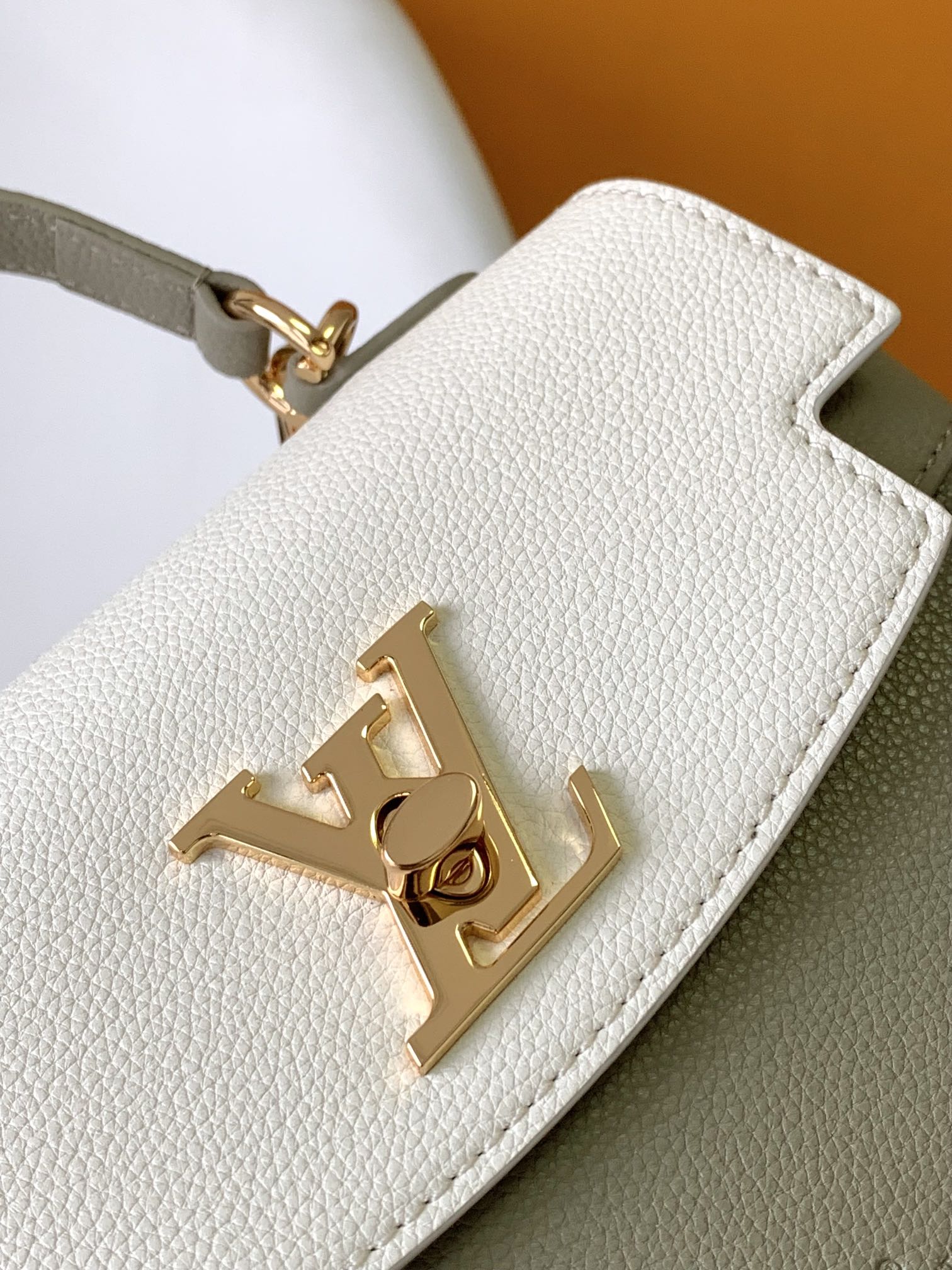 Louis Vuitton Elegant Sage Green and Cream Leather Top Handle Handbag with Gold Clasp