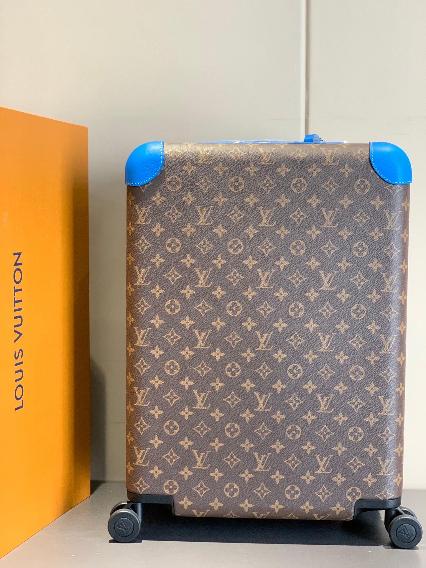 Retro Brown Monogram Spinner Suitcase with Blue Leather Trim