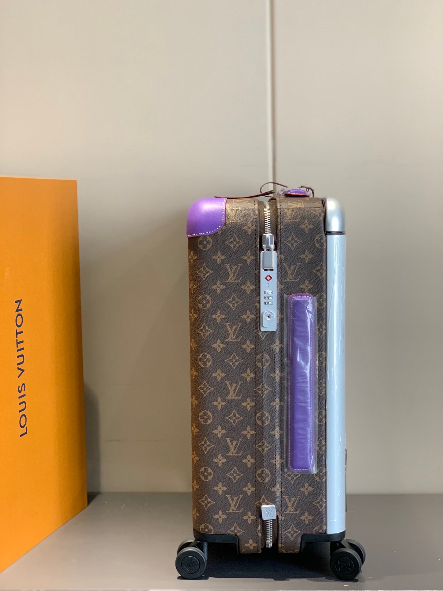 Luxury Brown Monogram Rolling Suitcase with Purple Accents