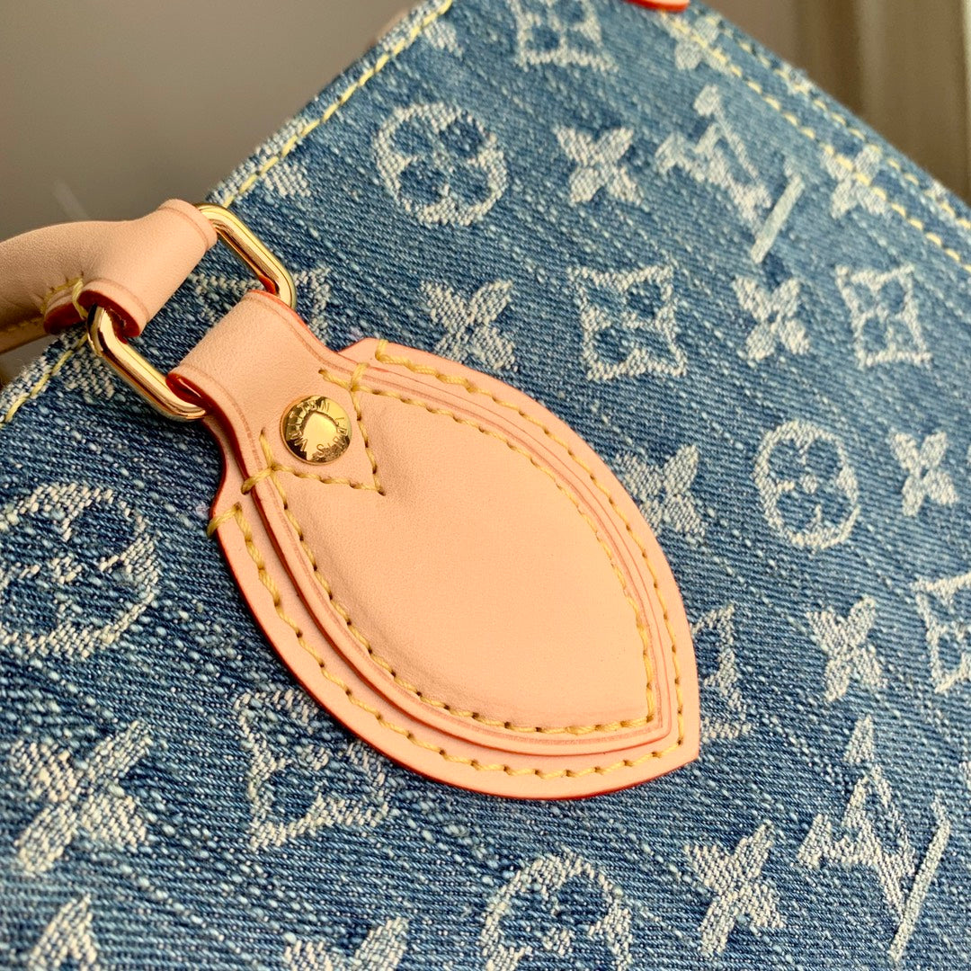 Louis Vuitton Classic Blue Denim Monogram Pattern Tote Handbag with Leather Handles