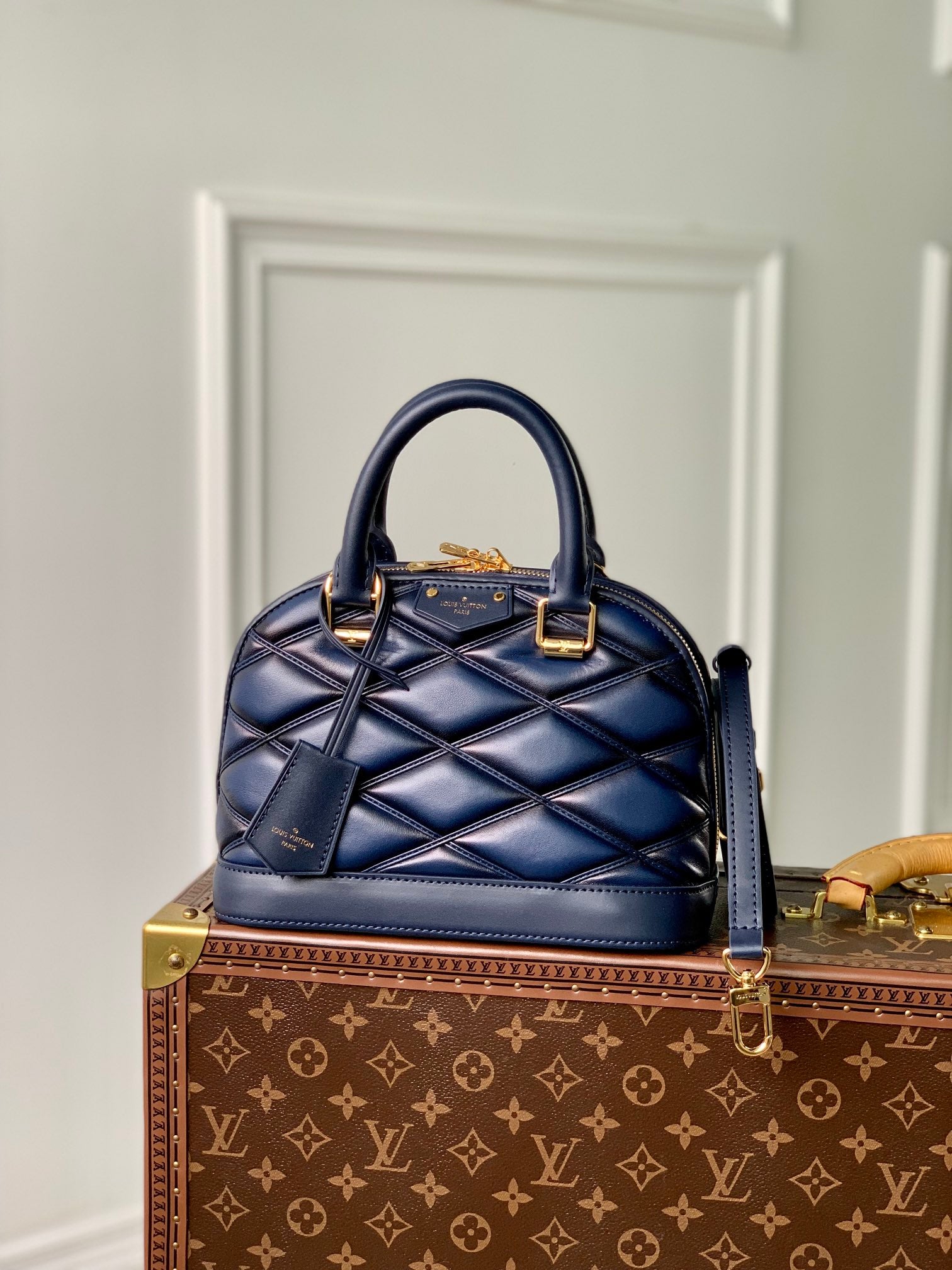 Louis Vuitton Elegant Navy Blue Quilted Leather Dome Handbag with Shoulder Strap
