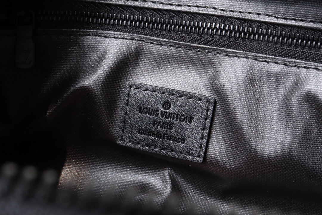 Louis Vuitton Luxury Black Embossed Monogram Dopp Kit Travel Toiletry Bag