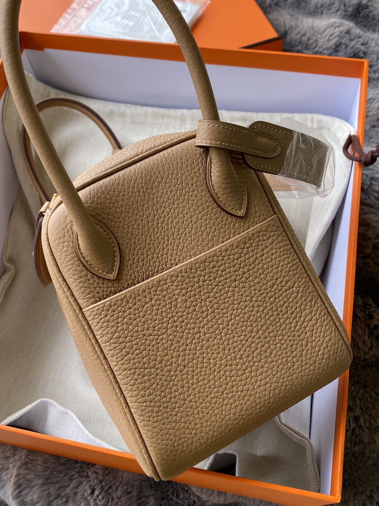 Hermès Lindy Handbag in Tan Leather with Gold-Tone Hardware