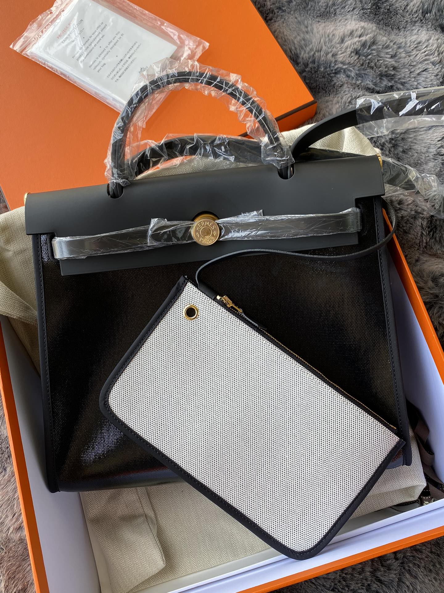 Classic Black Leather Top-Handle Handbag - Gold-Tone Hardware &amp; Geometric Charm Accessory