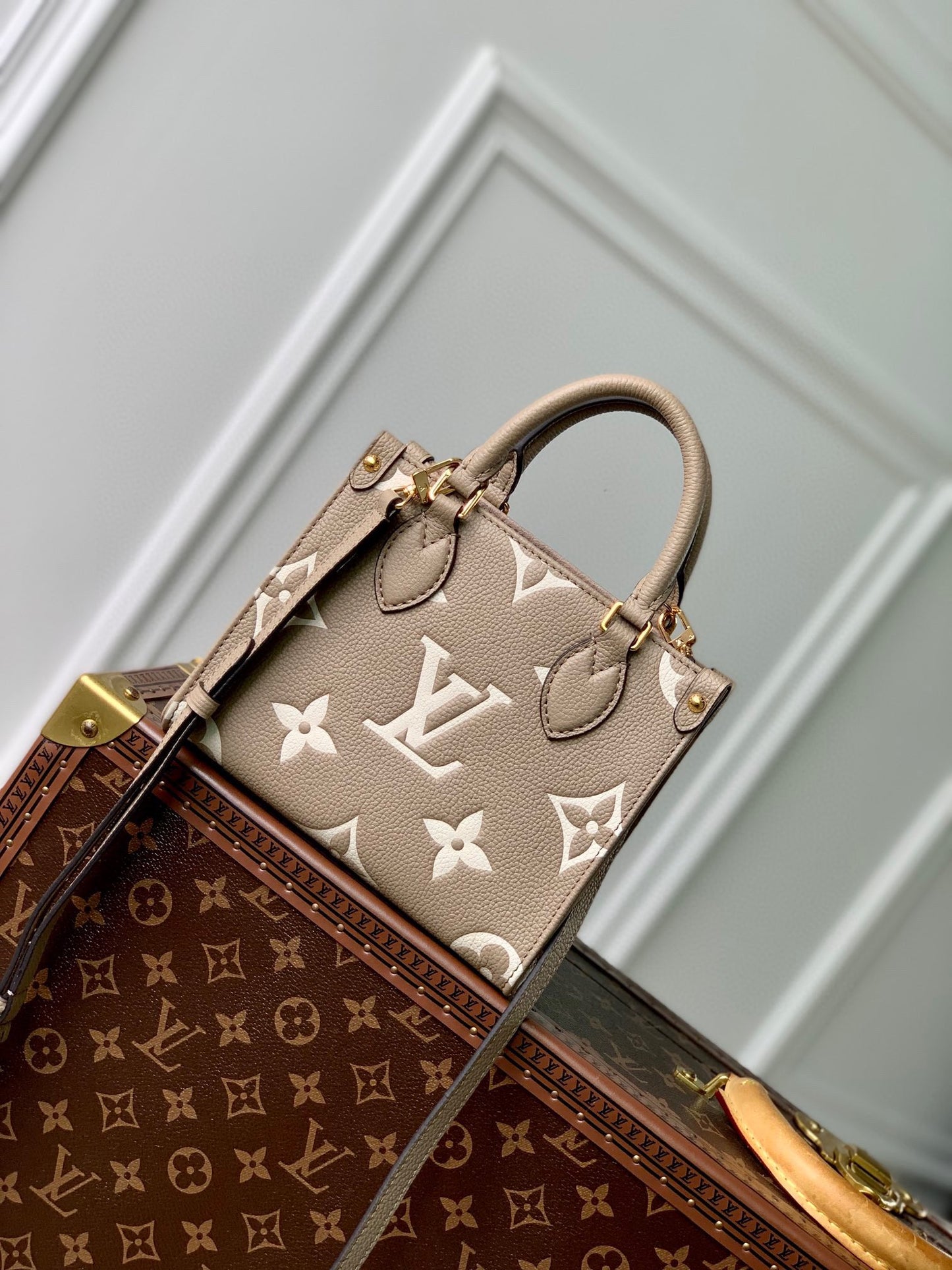 Louis Vuitton Elegant Taupe Embossed Leather Mini Tote Bag with Top Handles