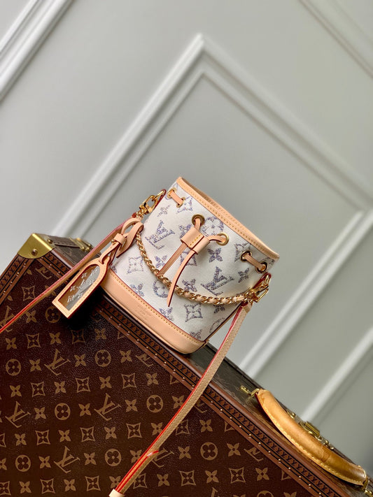 Louis Vuitton Luxury White Monogram Mini Bucket Bag with Gold Chain and Leather Trim