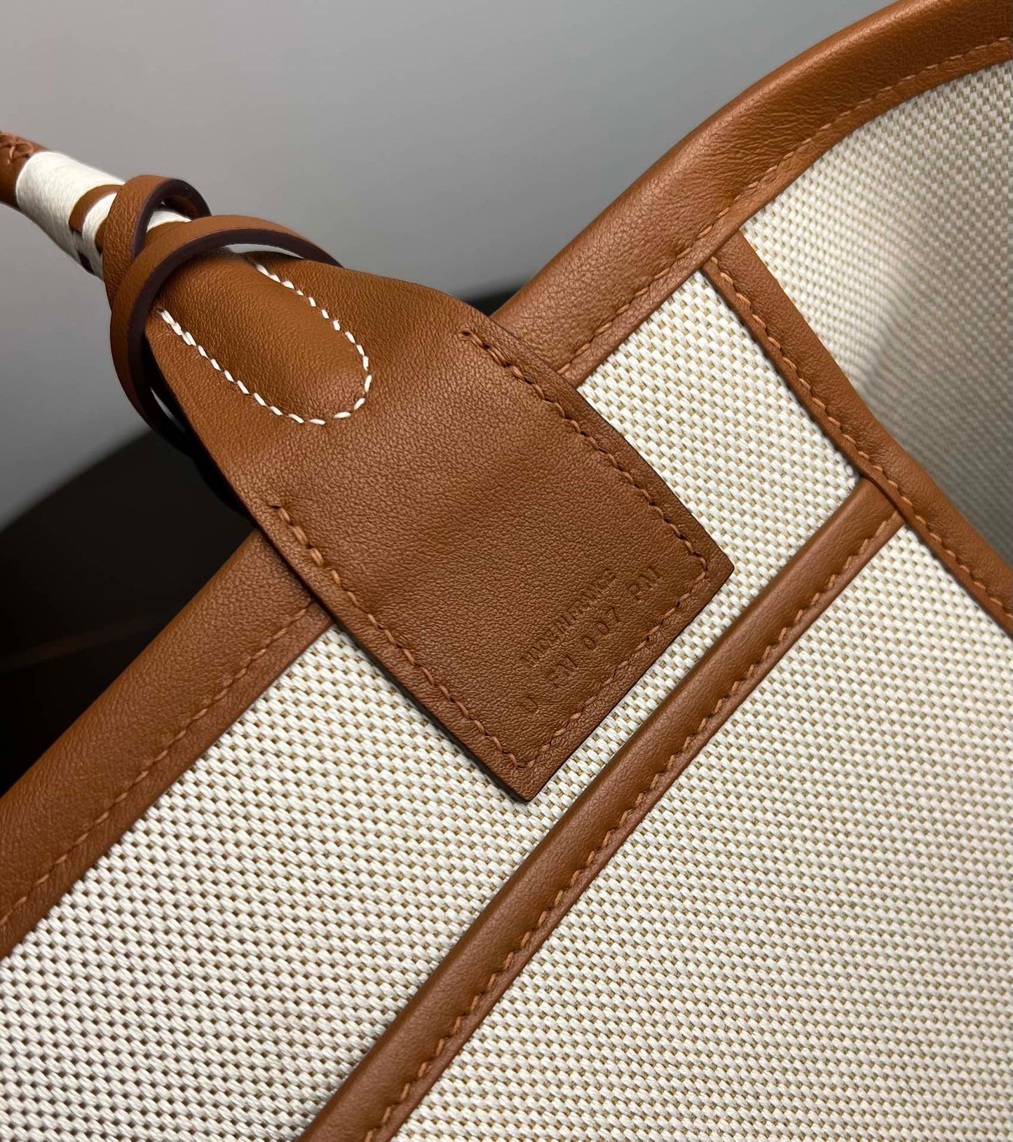 Luxury Stirrup Print Canvas Handbag with Brown Leather Detail