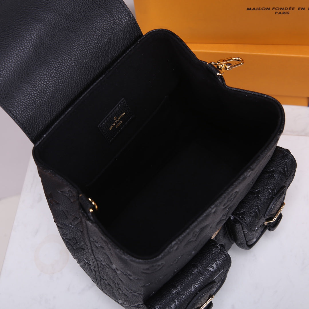Louis Vuitton Luxury Black Embossed Leather Backpack with Gold Buckles