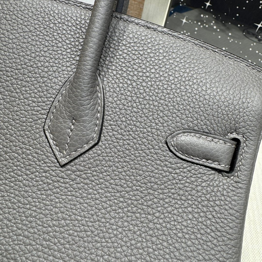 Luxury Grey Leather Top-Handle Handbag with Tan Flap and Silver Hardware