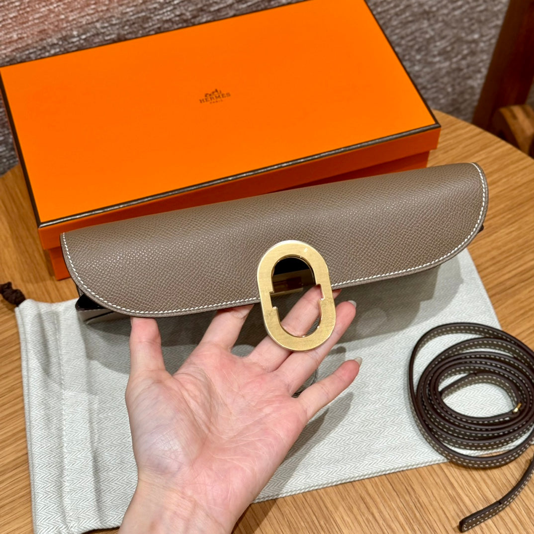 Hermès In-the-Loop Clutch Bag - Etoupe Leather with Gold Hardware