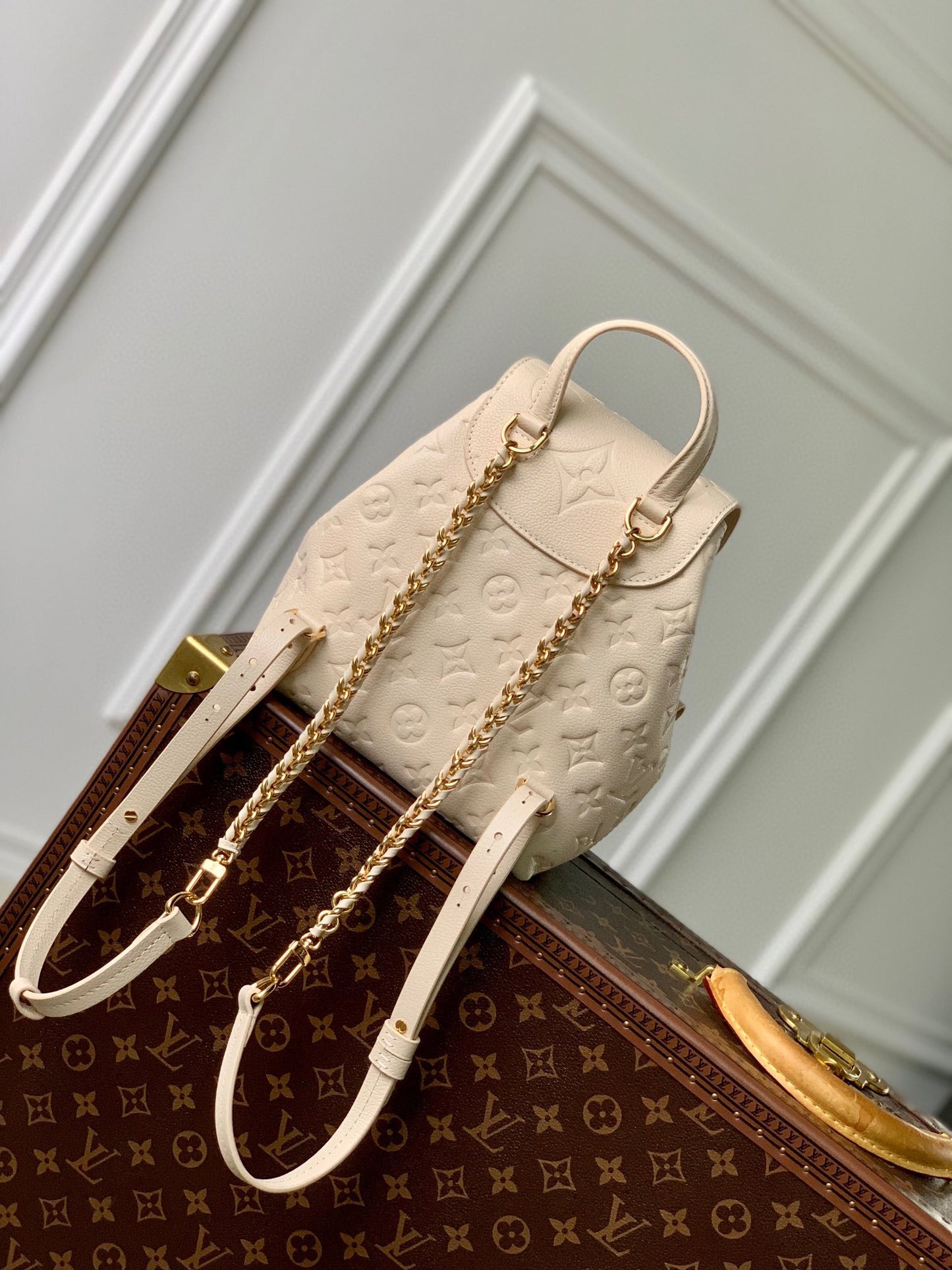 Louis Vuitton Off-White Embossed Leather Mini Backpack with Front Pockets