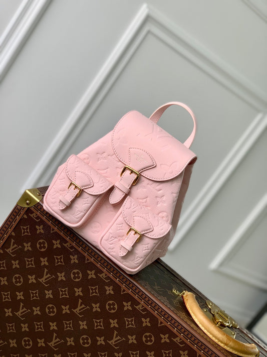 Louis Vuitton Pastel Pink Embossed Leather Mini Backpack with Gold Buckles