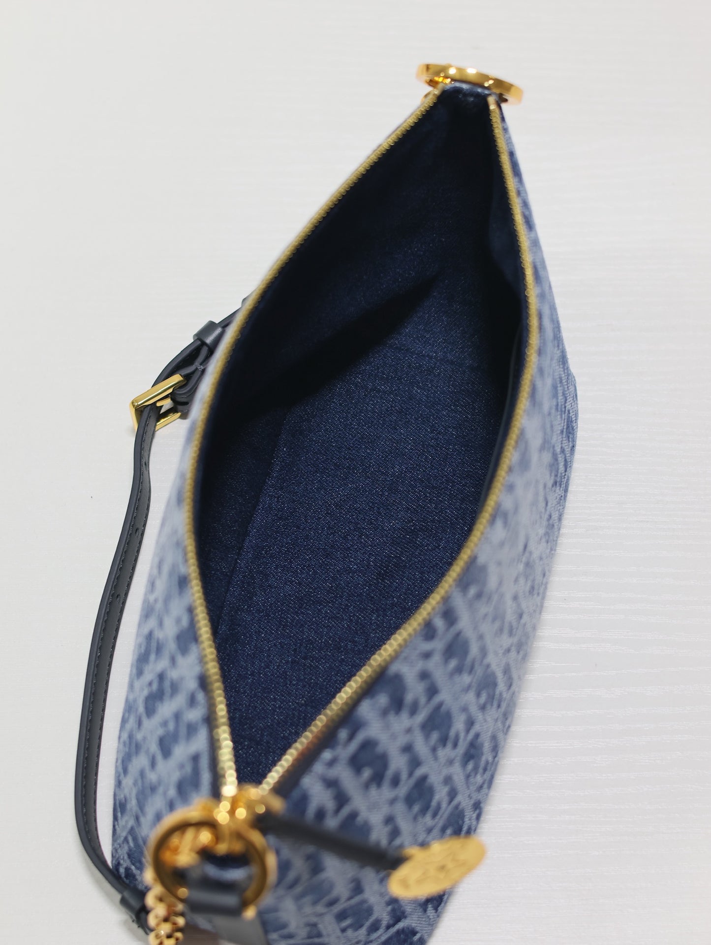 Chic Blue Monogram Oblique Hobo Bag with Gold Chain and Adjustable Shoulder Strap