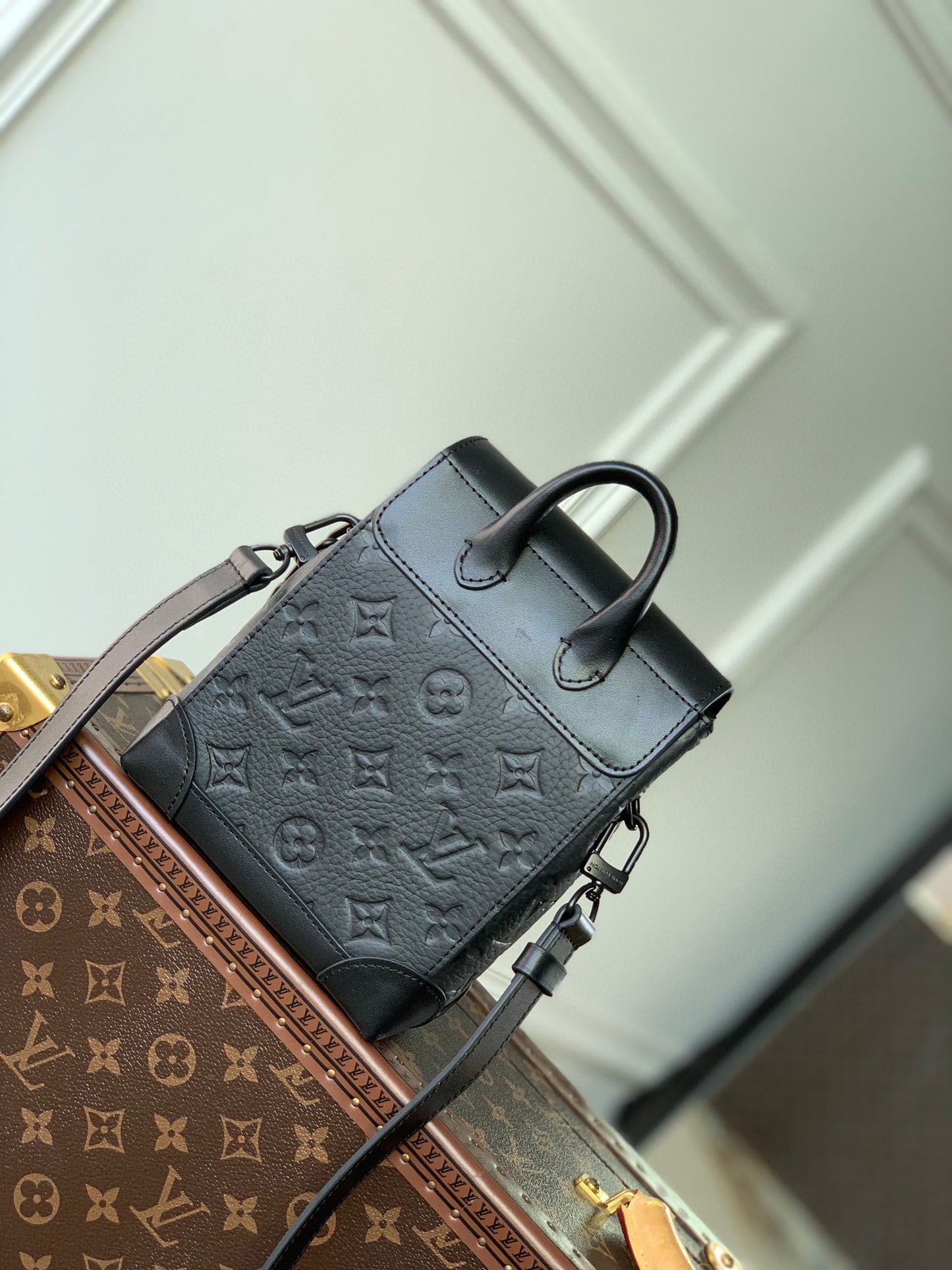 Louis Vuitton Matte Black Embossed Leather Mini Backpack Crossbody Bag with Chain Detail