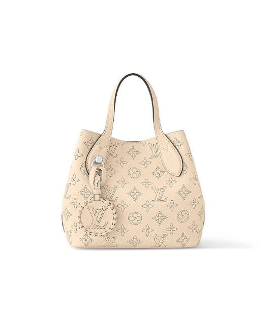 Louis Vuitton Luxury Cream Perforated Leather Tote Bag with Round Charm
