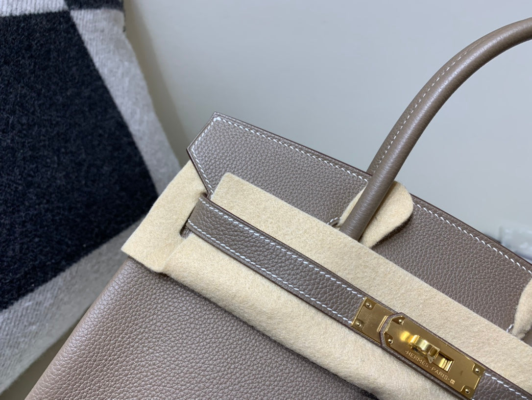 Classic Taupe Leather Top Handle Handbag with Gold-Toned Hardware