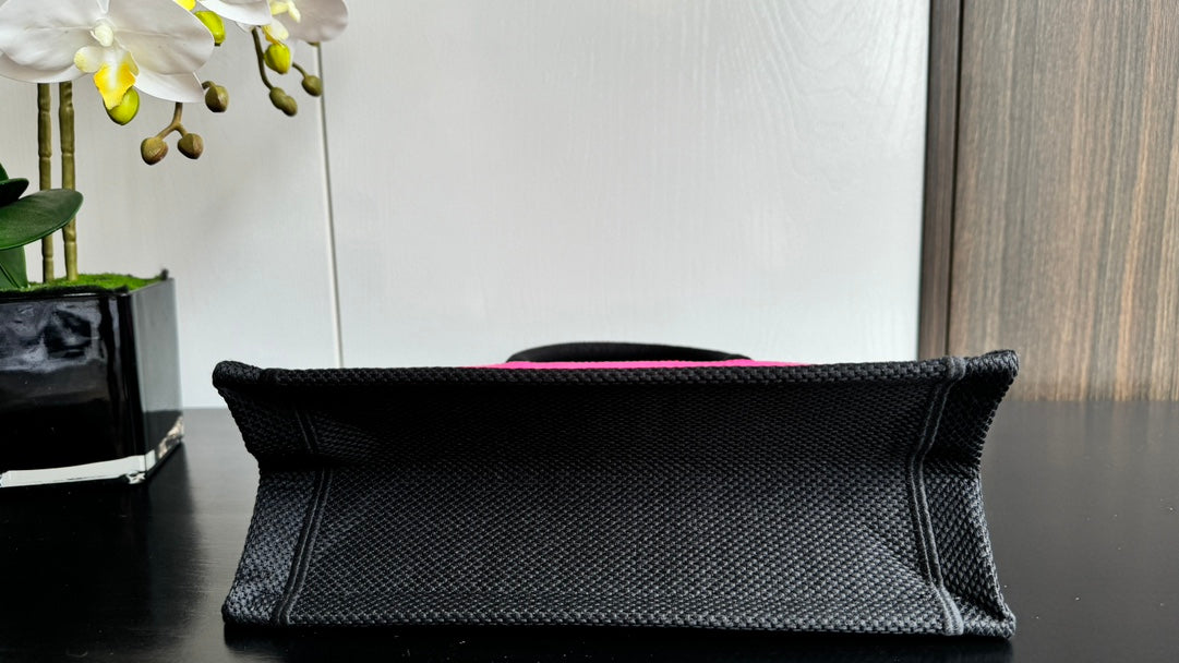 Dior Vibrant Pink Canvas Tote Bag with Bold Black Lettering and Top Handles