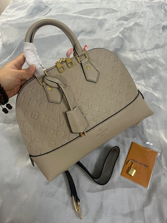 Louis Vuitton Neo Alma PM Monogram Empreinte Leather Turtledove Handbag