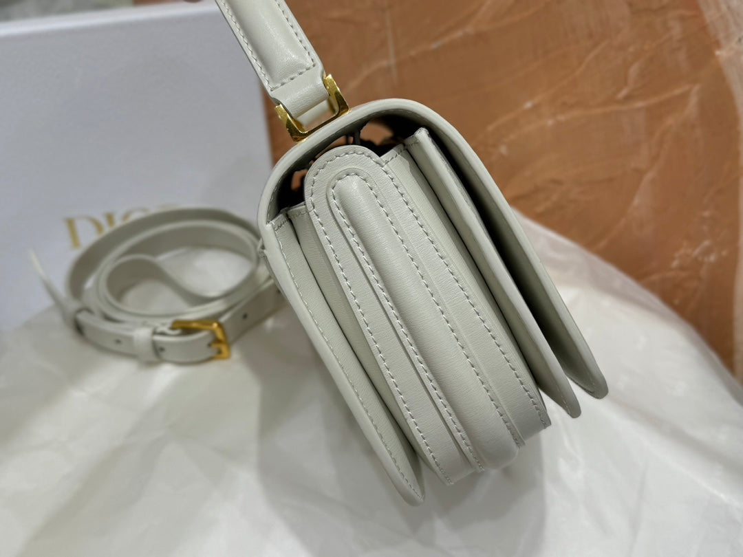 Dior Elegant White Leather Top Handle Handbag with Gold Buckle