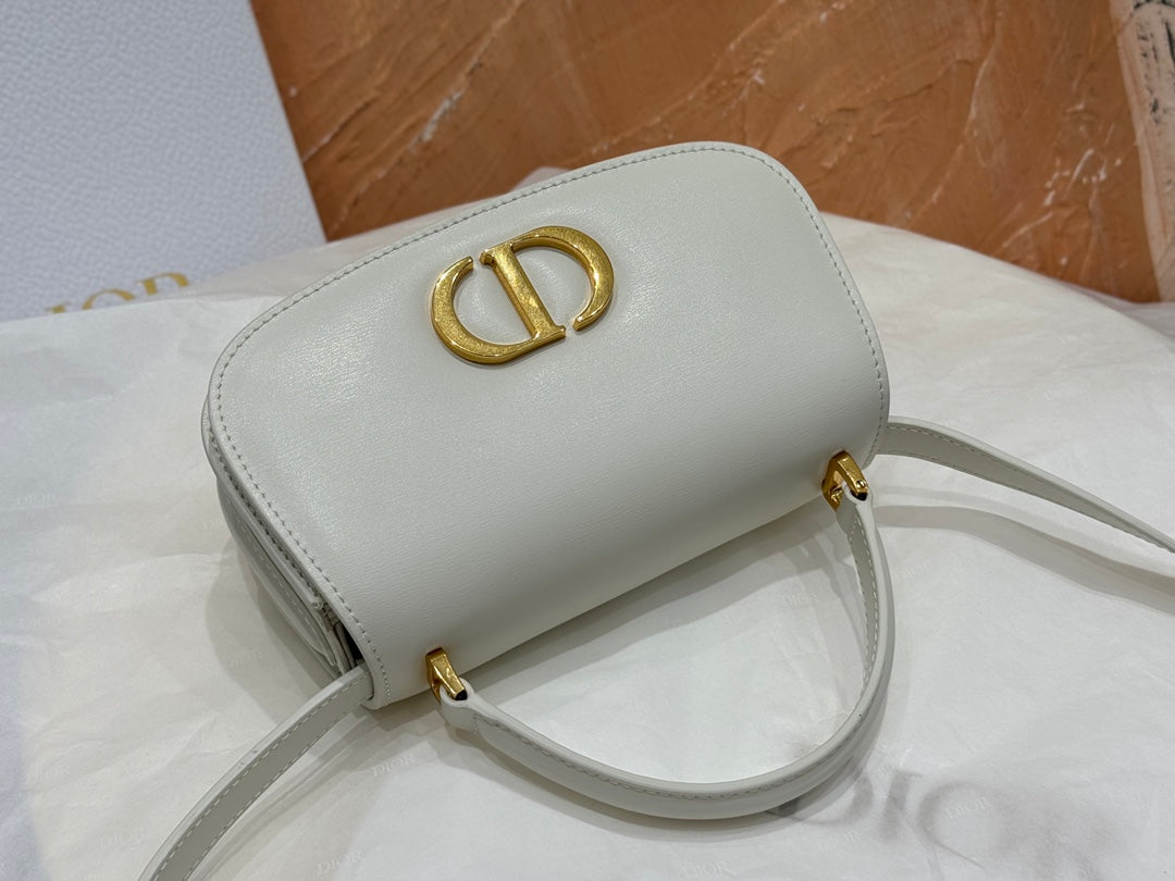 Luxury White Leather Top Handle Handbag with Gold-Tone Signature Logo and Adjustable Strap