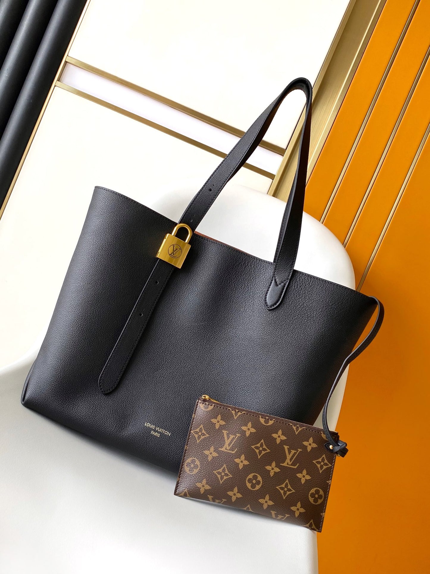 Louis Vuitton Classic Black Leather Shoulder Tote Bag with Gold Lock Detail