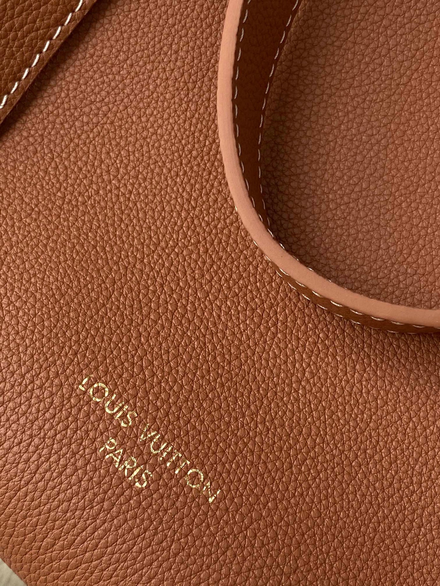 Louis Vuitton Classic Brown Leather Tote Bag with Gold Lock Accent and Shoulder Straps
