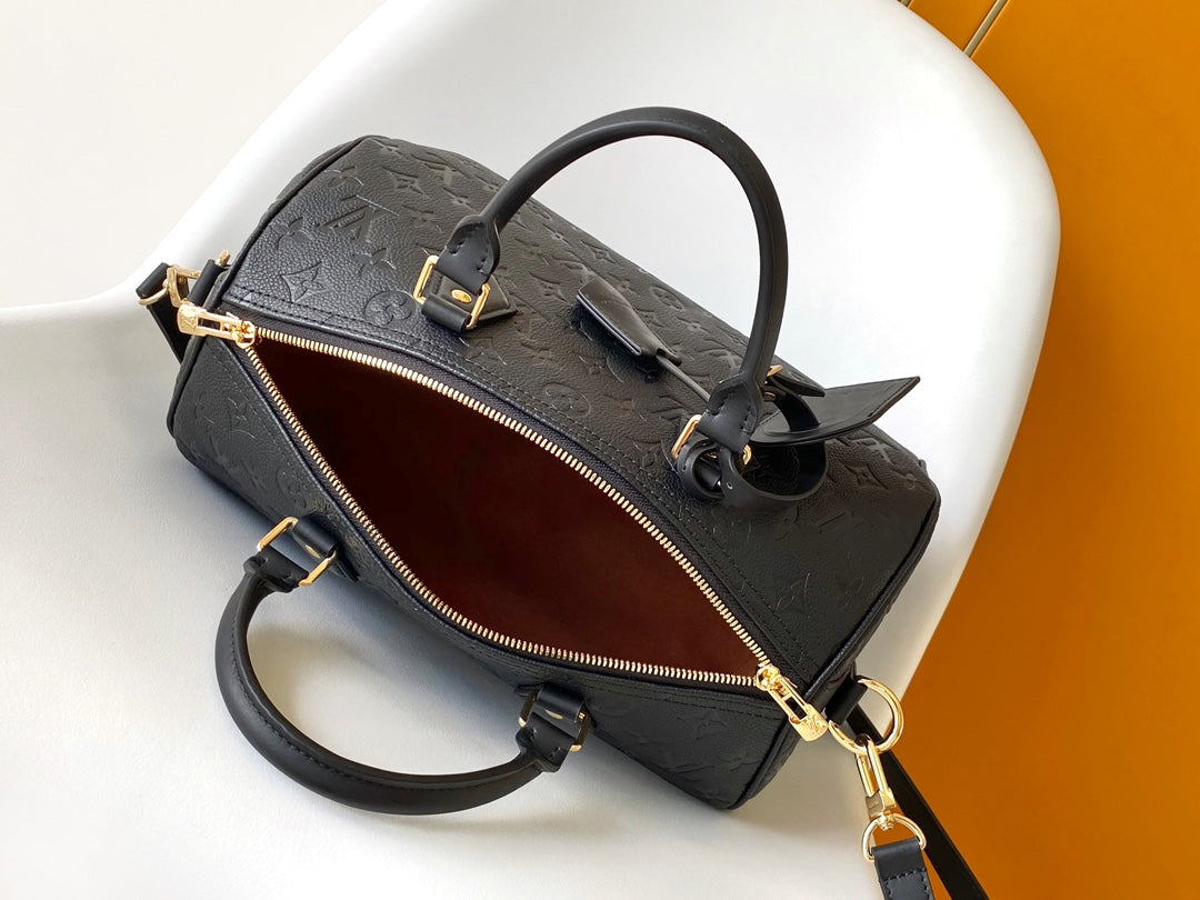 Louis Vuitton Black Embossed Leather Duffle Bag with Top Handles and Strap