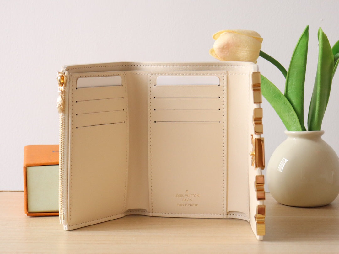 Louis Vuitton Luxury Cream Textured Leather Compact Wallet with Gold Clasp