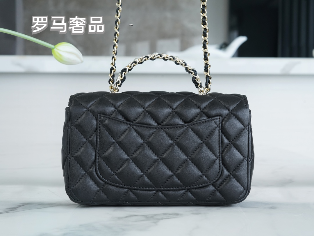 Elegant Black Quilted Leather Top Handle Flap Bag with Silver-Tone Chain