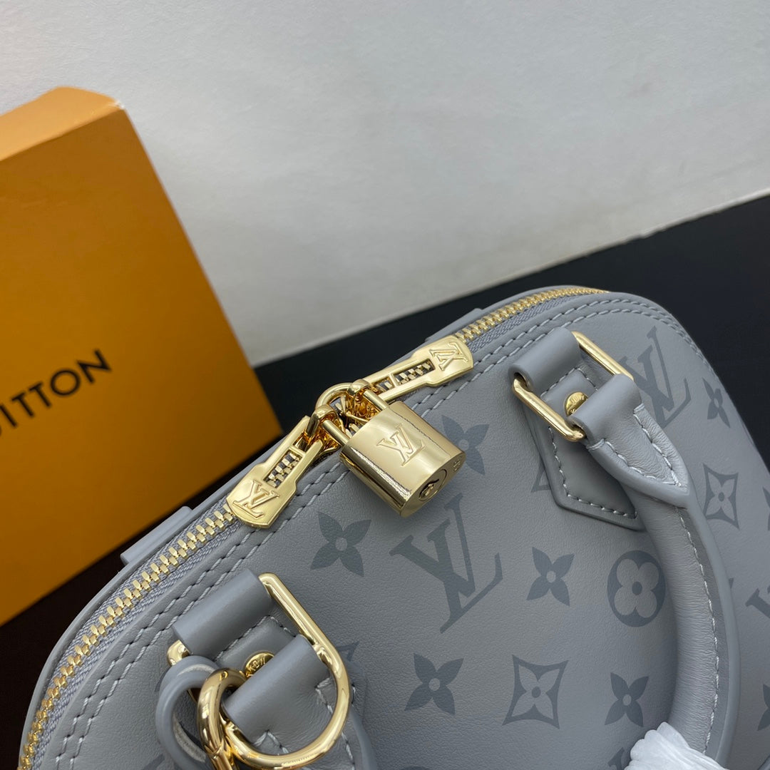 Louis Vuitton Alma BB Monogram Empreinte Leather Handbag - Grey