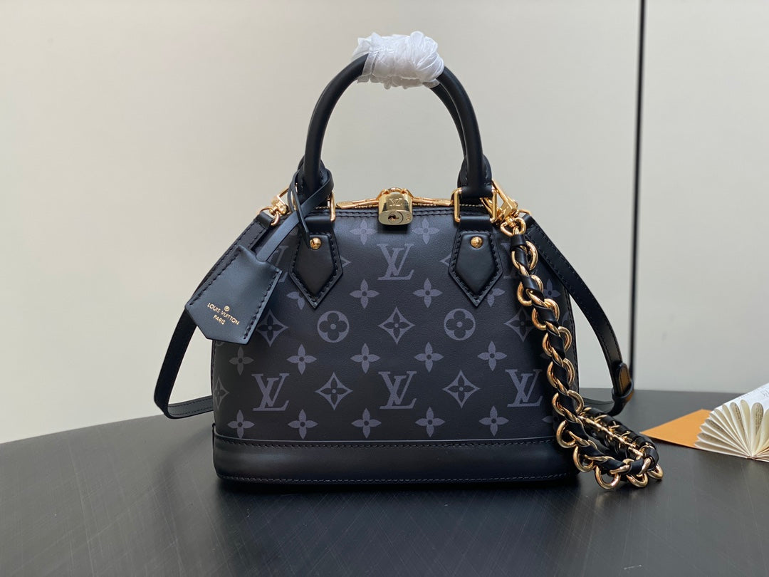 Louis Vuitton Elegant Black Embossed Leather Dome Satchel with Gold Chain