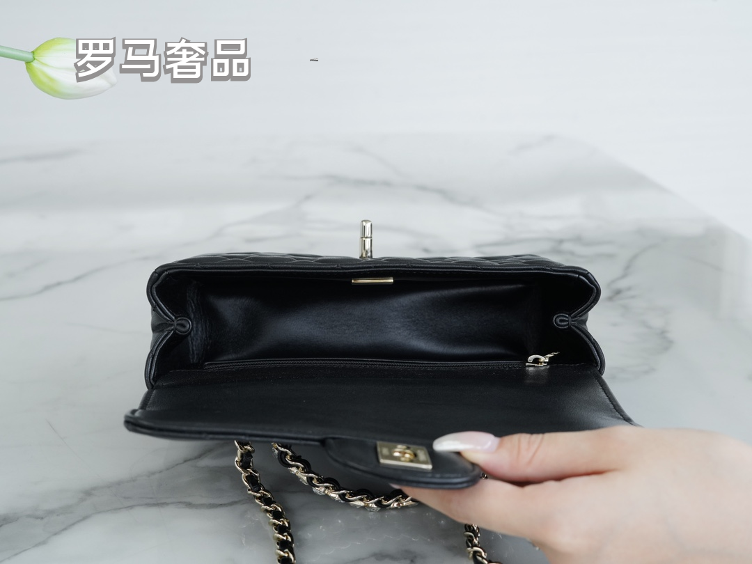 Elegant Black Quilted Leather Top Handle Flap Bag with Silver-Tone Chain