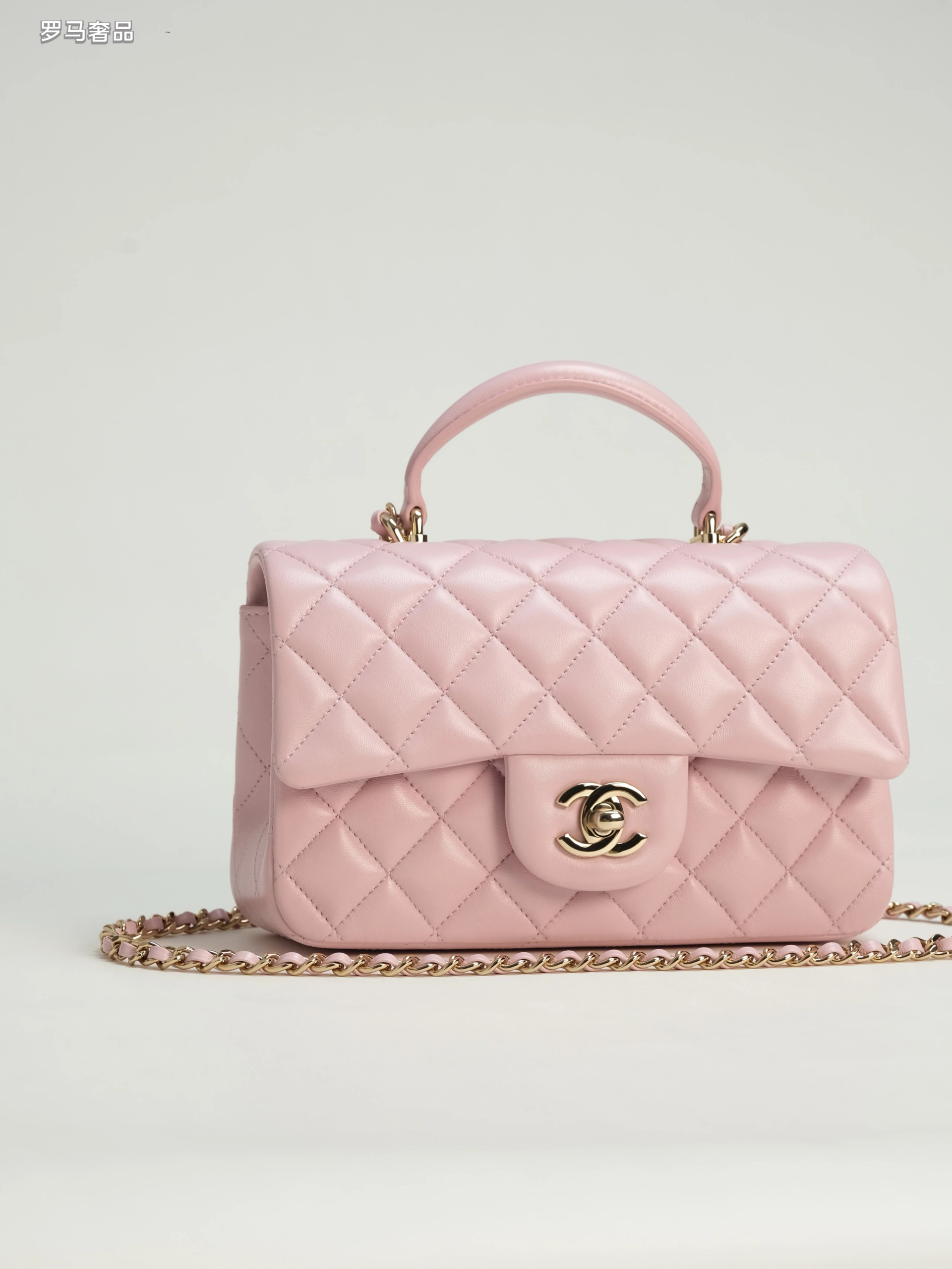 Pink Quilted Top Handle Handbag with Gold-Tone Chain Strap