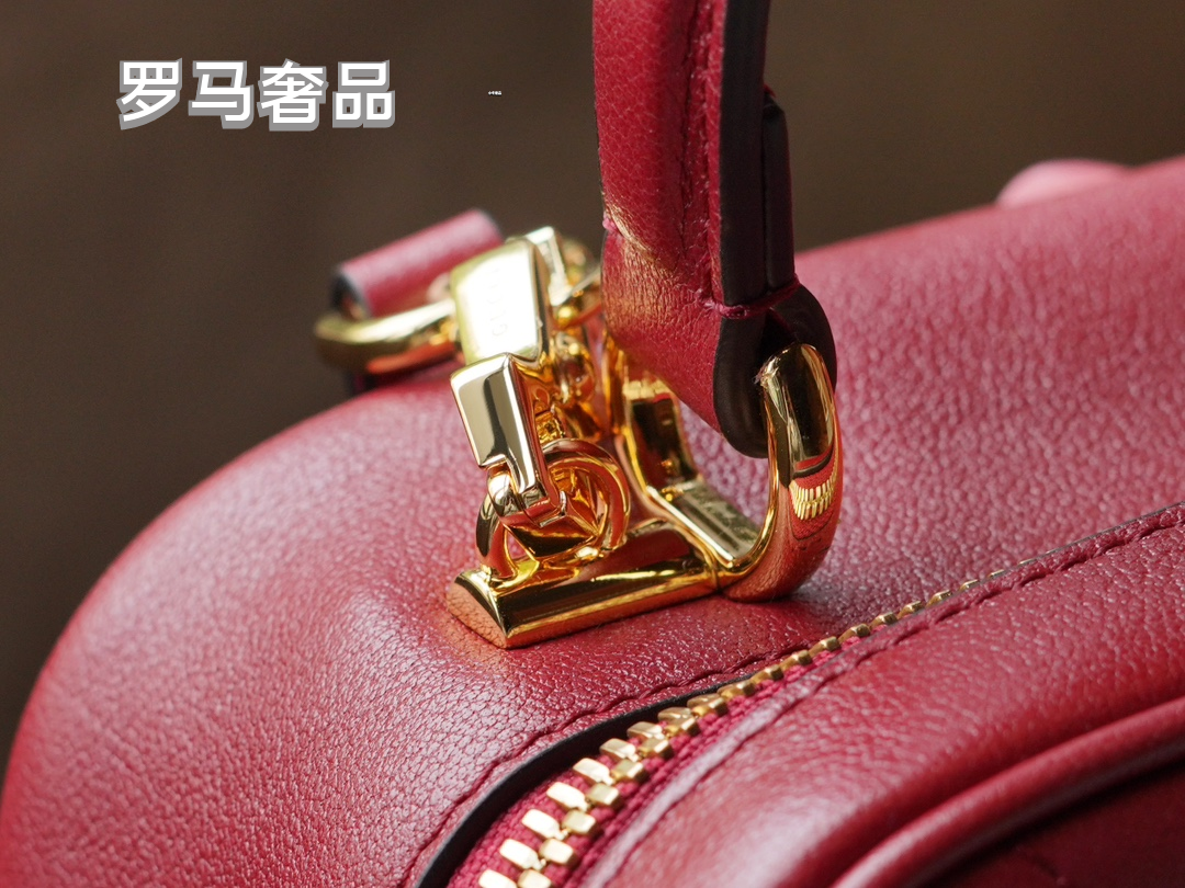Gucci Red Leather Crossbody Camera Bag with Embossed Logo and Tassel