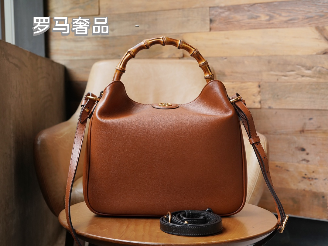 Gucci Vintage Black Leather Handbag with Bamboo Handle and Shoulder Strap