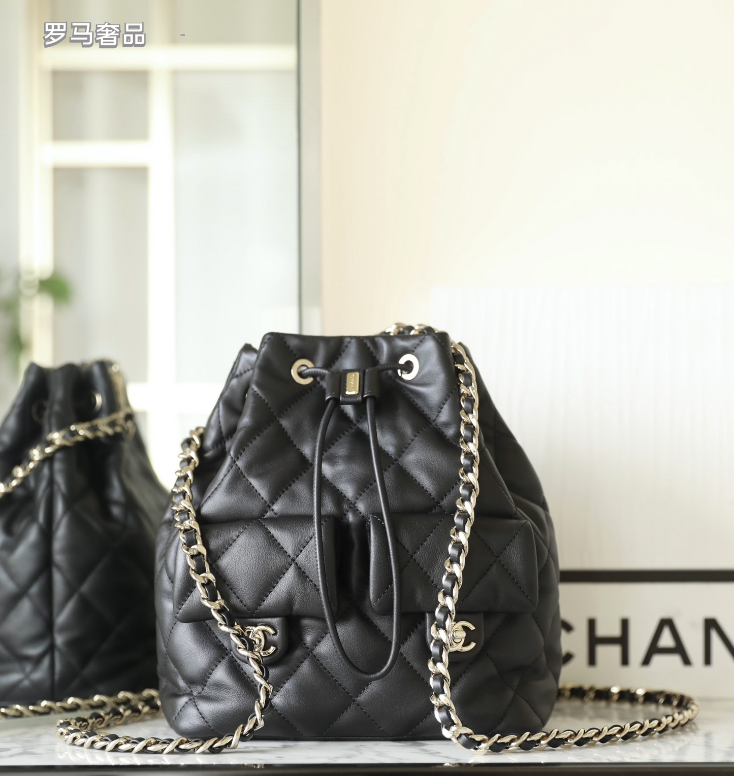Chanel-Style Quilted Black Leather Bucket Bag with Silver Chain Strap